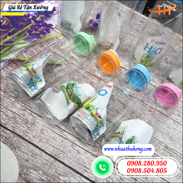 Kho bỏ sỉ bình nước nhựa 1L nhiều màu giá rẻ tận kho 3 bình nước nhựa nắp màu 1L